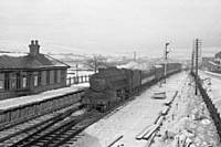 photo R6 45337, an Agecroft Shed engine, on the midday Wakefield to Manchester Victoria stopper, approaches Smithy Bridge Station Down platform, 15th Jan 1960(45337 may be returning to ELR at Bury). RS Greenwood.